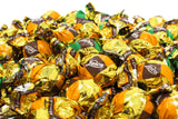 BOULES VERDE ARANCIO CIOCCOLATO AL LATTE RIPIENE DI CREMA NOCCIOLA E CEREALI BUSTA KG 1 Laica